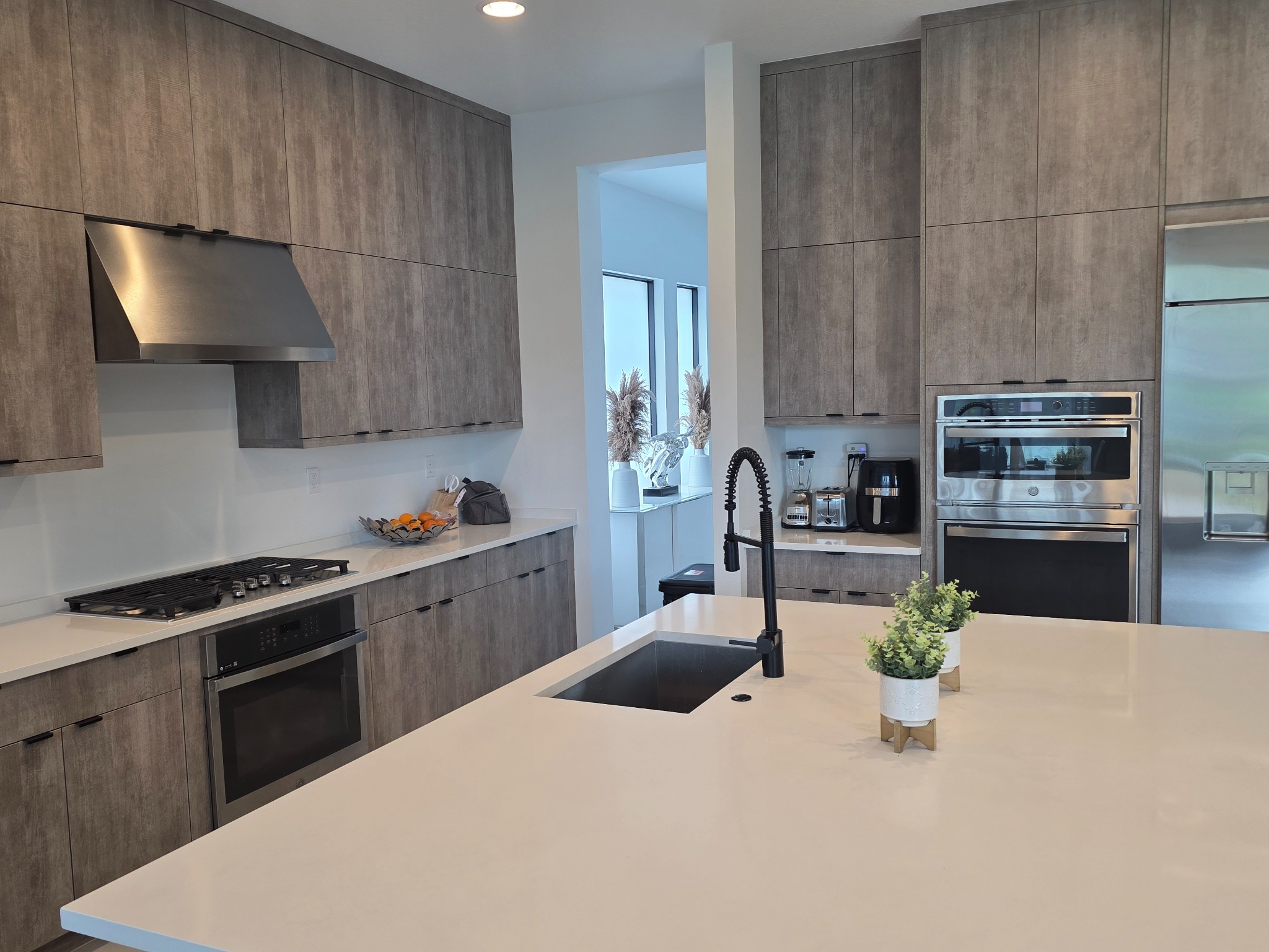 Home 2 kitchen cabinetry, appliances, and island