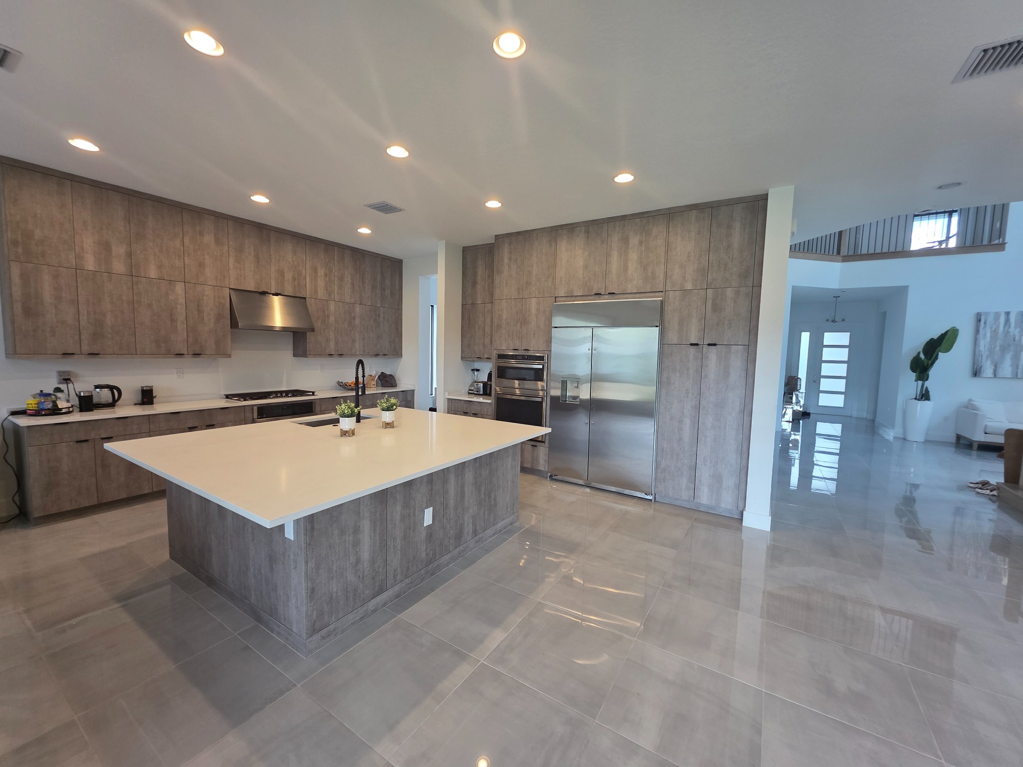 Wide view of the Home 2 kitchen and island